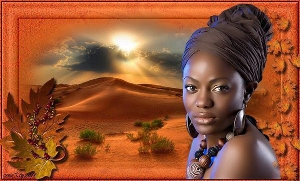 Le joli visage d'une africaine devant les dunes...